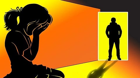 Interior of a hospital corridor and a girl is in distress and a man standing in an authoritative way at the door.  