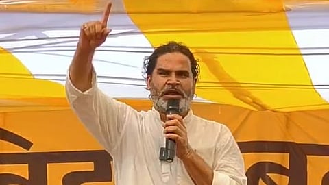 In the image Prashant Kishor is shown adressing the audience