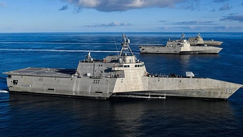 In the image Warships are shown in the ocean: The Independence variant littoral combat ships USS Tulsa (LCS 16)