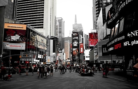 In the image New York street is shown crowded with people