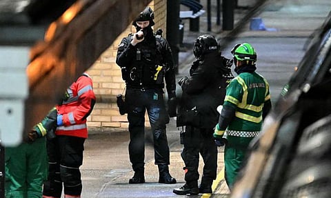 Image of security officers and police officers at the Cambridgeshire after the mass stabbing incident 