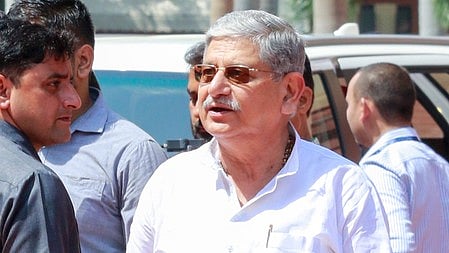 Union Minister Rajiv Ranjan Singh (Lalan Singh) at the Parliament House during the Monsoon Session in New Delhi, Thursday, August 07, 2025. He is wearing a white kurta and spectacles. 