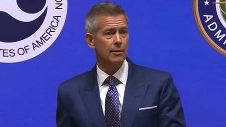 Transportation Secretary Sean Duffy at a press conference. He is wearing a suit.