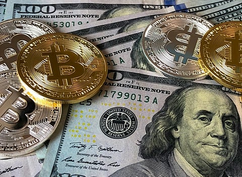 https://www.pexels.com/photo/bitcoins-and-u-s-dollar-bills-730547/