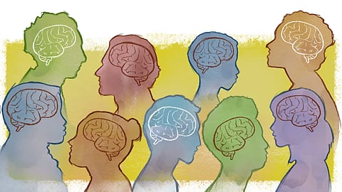 Sketch: outlines of many people with in different colours, some have red brains, some white.