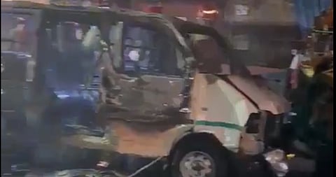 In the image a car is shown fully damaged because of fire