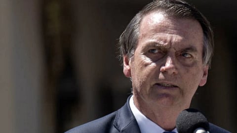  Ex-Pres Bolsonaro adressing people. he is wearing formal suit