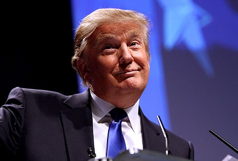 Image of US president Donald Trump smiling speaking at CPAC in Washington D.C. on February 10, 2011.