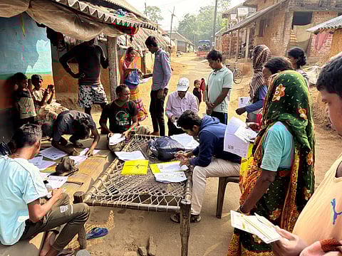 Enumeration Form fill-up going on in presence of BLO and Supervisors in the tribal village areas of Purulia district West Bengal.