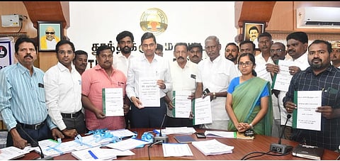 DEO of Thoothukudi, TN, presenting the draft electoral roll in the presence of party agents.