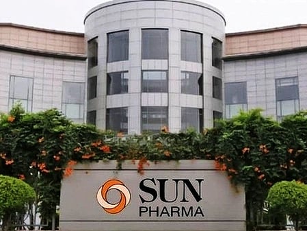 Main building of a Sun Pharma office, with board bearing the company name in front.