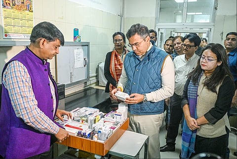 Delhi Minister Parvesh Verma, along with other NDMC officials, inspects the medicines during the inauguration of the Ayushman Arogya Mandir.