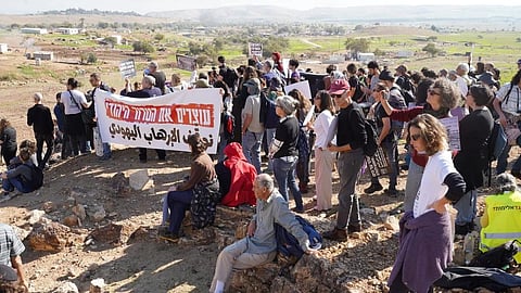 Protesters protesting against Israel's military strikes in West Bank