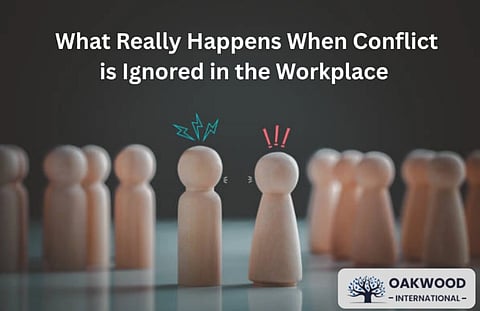 Wooden figures with symbols of anger face each other amidst a group. Text reads "What Really Happens When Conflict is Ignored in the Workplace."