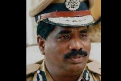 Closeup photo of DGP K. Ramachandra Rao in his official uniform. he is seen with a serious expression, wearing a decorated police hat. 