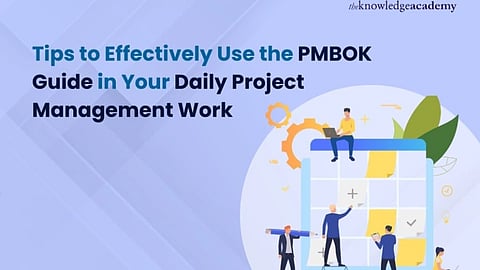"Illustration of diverse professionals interacting with a large calendar, representing project management. Text reads: 'Tips to Effectively Use the PMBOK Guide in Your Daily Project Management Work.' The tone is professional and instructional."
