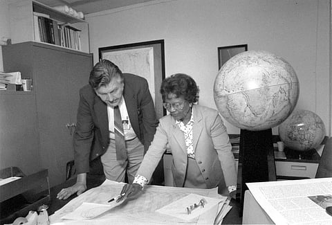 Gladys West and Sam Smith look over data from the Global Positioning System, which Gladys helped develop at the Naval Proving Ground in Dahlgren, VA in 1985