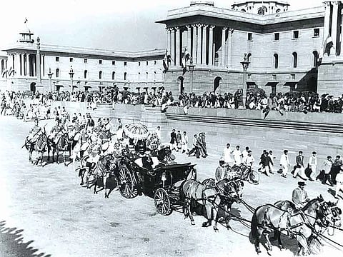 A black and white photo of India's first republic day, showing President Prasad in a carriage.
