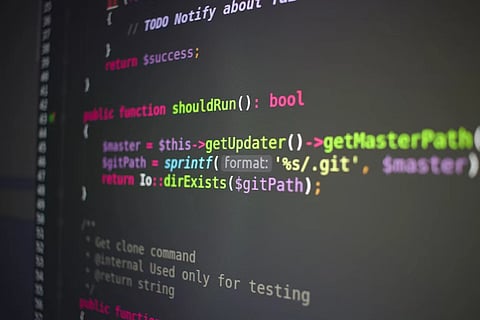 A computer screen showing a page of code in php.