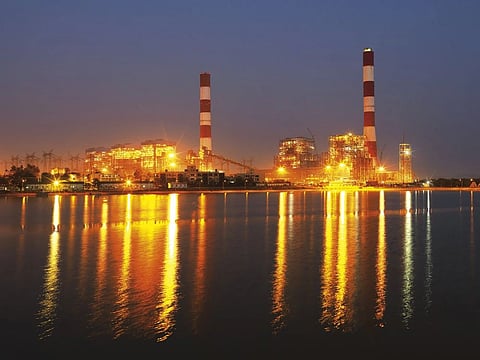 Adani power plant in Tirora, Maharashtra, from across a body of water