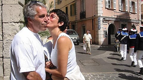 Ghislaine Maxwell kissing Jeffery Epstein inn a roadside