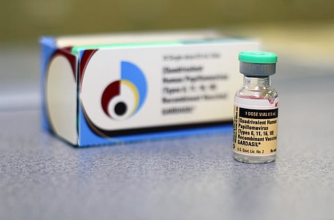 Gardasil vaccine bottle in front of the box.