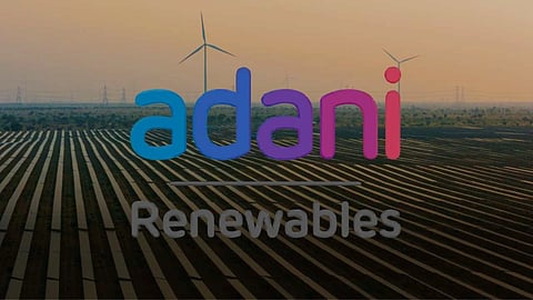 Adani Green Energy logo on a background of a solar and wind farm