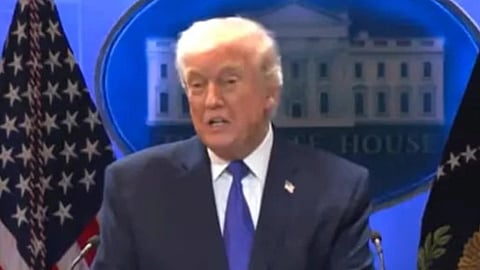 President of the Unites States Donald Trump standing behind the podium addressing a press conference 