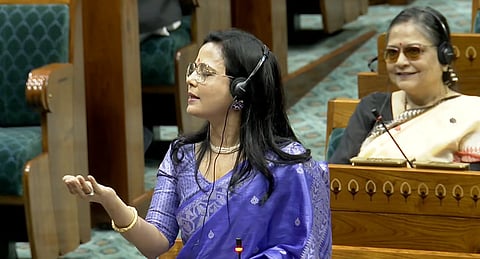 TMC MP Mahua Moitra speaking in Lok Sabha with her hand raised