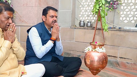Devendra Fadnavis praying with folded hands in front of a lota on Maha Shivratri