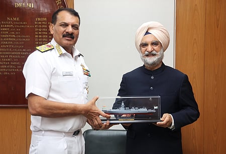 Navy chief Dinesh K Tripathi presents ceremonial memento to Delhi L-G TS Sandhu          