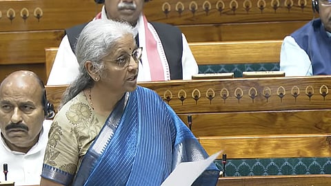 Nirmala Sitharaman speaking in Lok Sabh with papers in hand