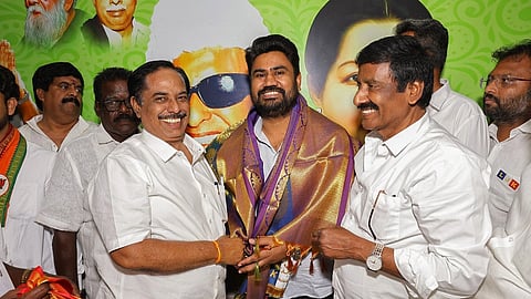 Jose Charles Martin wearing a shawl, smiling with LJK leaders