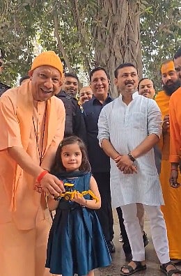 A toy bulldozer and a big smile: Little girl’s sweet gesture delights UP CM Yogi