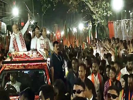 HM Amit Shah holds massive roadshow in Guwahati, steps up BJP