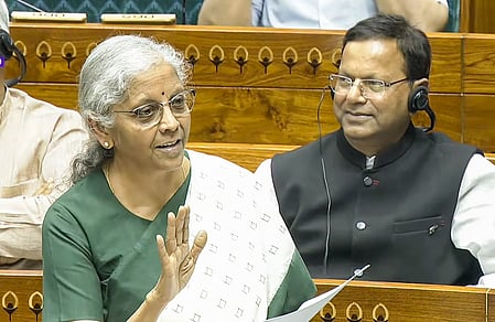 New Delhi: Union Finance Minister Nirmala Sitharaman speaks in the Lok Sabha during the second part of the Budget Session of Parliament in New Delhi on Wednesday, March 25, 2026. (Photo: IANS/Video Grab/Sansad TV)