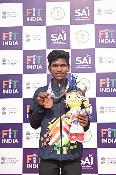 How a self-taught Suraj Mashi bagged men’s 5000m silver with borrowed spikes at the Khelo India Tribal Games (KITG) in Jagdalpur, Chhattisgarh, on Tuesday. Photo credit: KITG 2026