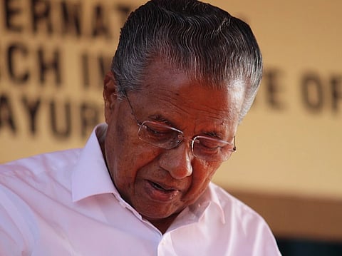 Kerala Assembly Election 2026|Image of Kerala CM Pinarayi Vijayan inagurating international reserch institute in ayurveda institure. In the image he is seen looking downwards. 