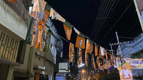 BJP and TMC flags hang from ropes