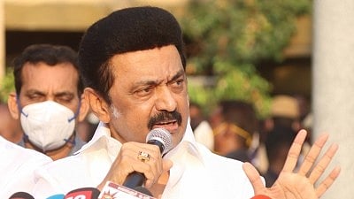 DMK Chief and Tamil Nadu Chief Minister M.K. Stalin speaking with a microphone in his hand