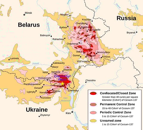 Map showing radiation zones around Chernobyl. Areas in red indicate confiscated zones, pink for permanent control, and orange for periodic control.