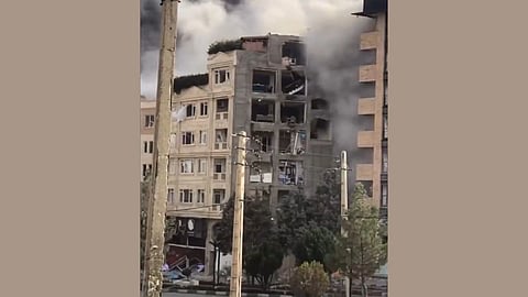 A damaged building by the US-Israeli strikes on Iran