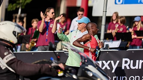 Sebastian Sawe and Yomif Kejelcha running during historic sub-two hour marathon performance in London