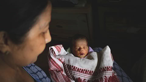 Tribal women, especially from the Sahariya community, are facing a convergence of erratic weather, crop loss, and mounting debt, creating a high-risk environment for pregnancy and childbirth.
