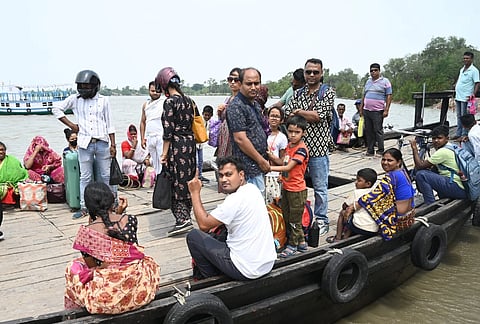 West Bengal voters sitting in a boat