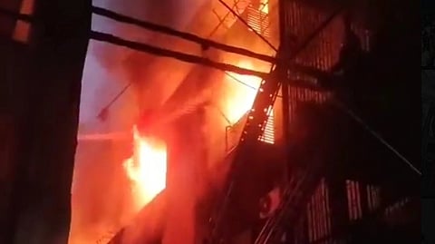 Firefighters at Vivek Vihar building fire site in Delhi where multiple casualties were reported