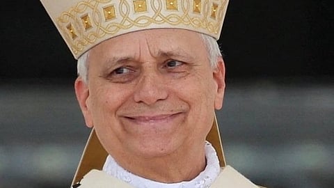 In the image pope leo is shown smiling while wearing his pope outfit