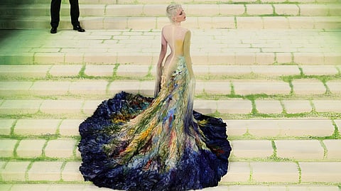 In the image Emma  Chamberlain  is shown wearing a ustom Mugler by Miguel Castro Freitas for met gala 2026