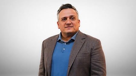Avengers Doomsday director Joe Russo posing to the camera