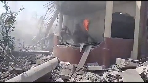 screeshot of a video of debris and fire